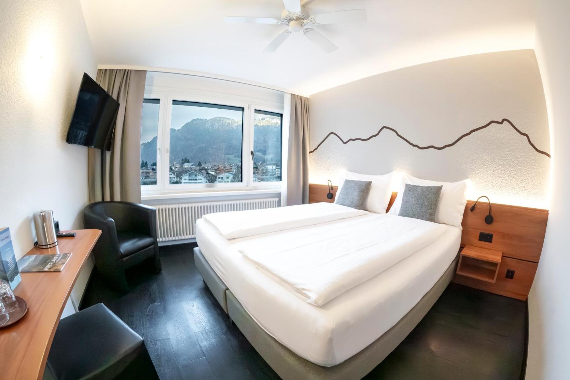Hotel Merkur - West Station Интерлакен Екстериор снимка